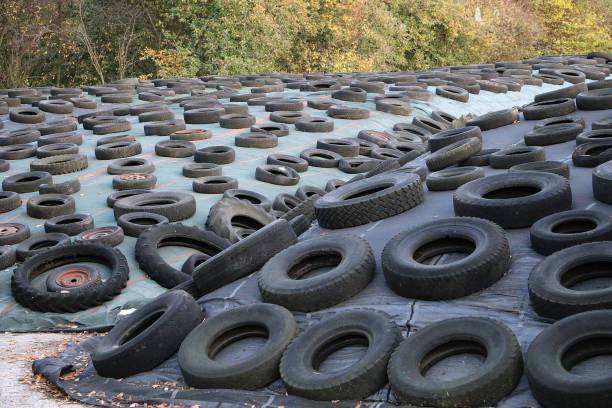 istock Bunch of tires organized in rows in a park 1267936002