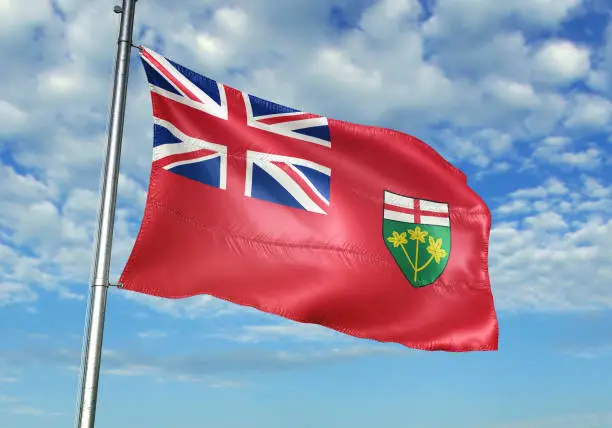 Photo of Ontario of Canada flag waving with sky on background