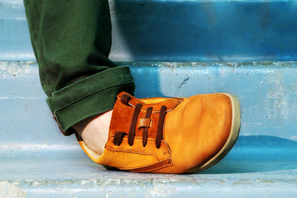 istock getting leg injury on stairs close up. 1267938904