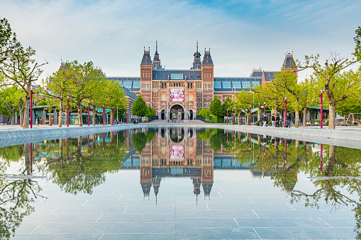 07 may 2020, Amsterdam, the Netherlands - Rijksmuseum is a popular tourist landmark but closed due to corona virus measures.\nHigh dynamic range HDR image taken during dusk.
