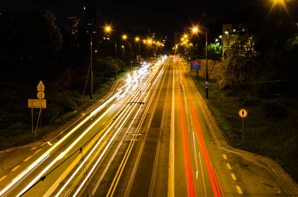 istock City road fast traffic at night, speed lines - long time exposure 1267946949