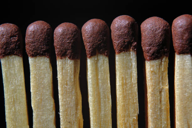 istock match heads on a black background 1267959303