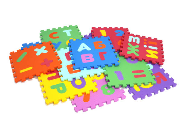 istock puzzle mat - multicolored soft elements letters and numbers on a white background 1267962912