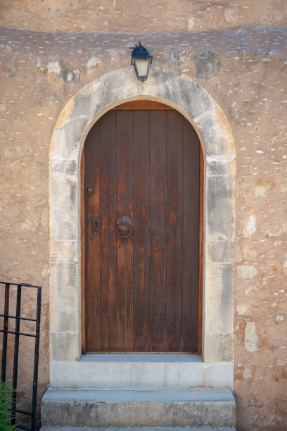 istock Traditional Aegean architecture wooden door. 1267984014