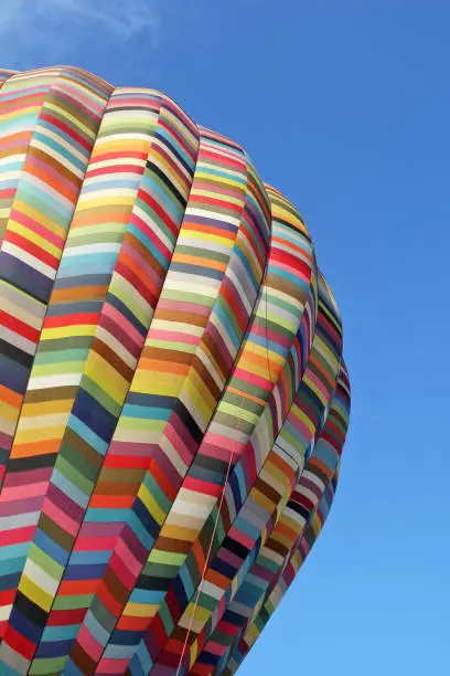 Multicolored air balloons close-up on blue sky