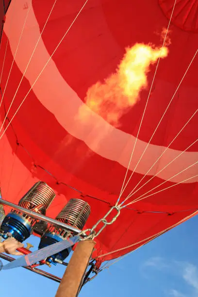Hot air balloon with flame lit by a gas burner