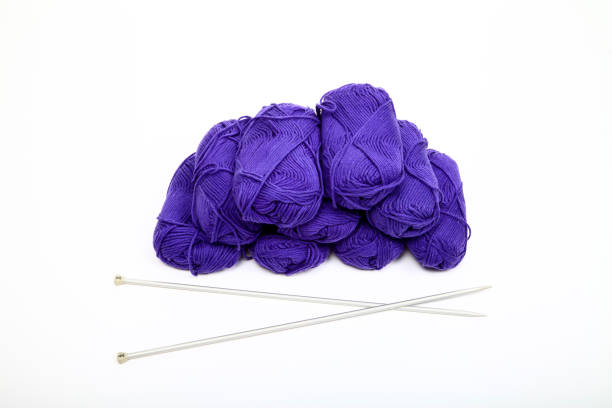 istock Balls of purple knitting wool 1267992597