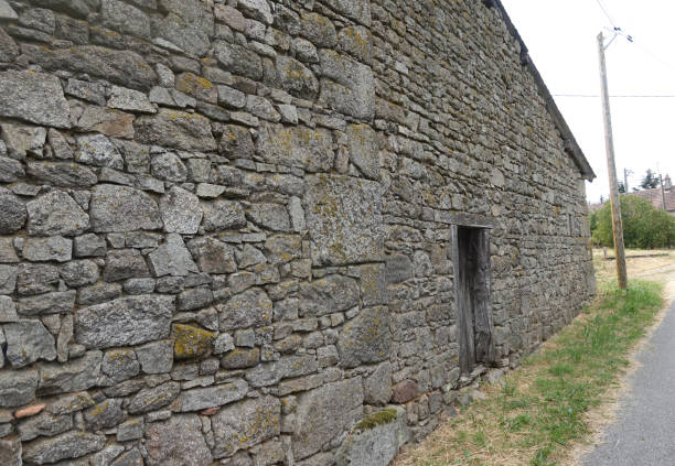 istock Ancient wall in granite stones  Old village 1267994749