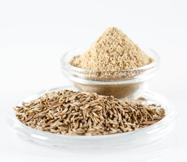 istock Cumin in a plate Isolated on a white background. 1268013662