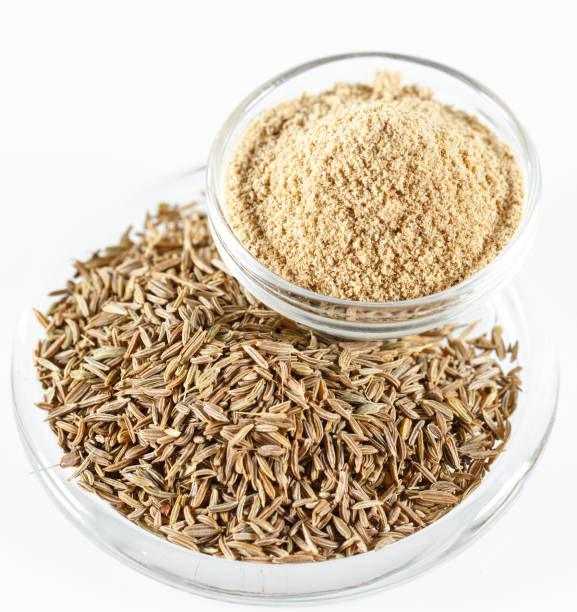 istock Cumin in a plate Isolated on a white background. 1268014123