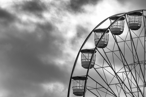 Warsaw, Poland, January 28, 2024: Ferris wheel and the concert stage during the grand finale of the Great Orchestra of Christmas Charity