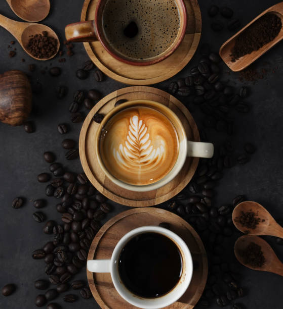 istock Cup of coffee and Coffee composition on black background. Copy space. Top view. Flat lay. 1268026220