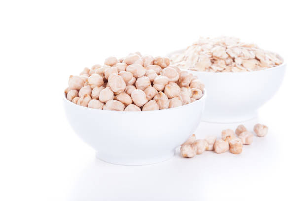 istock Low carbohydrates in assortment, chickpeas and oat flakes 1268031338