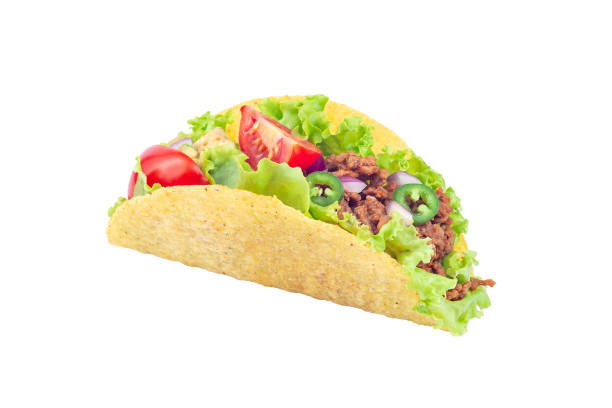 istock One taco shell with lettuce, ground beef meat,  mashed avocado, tomato, red onion and jalapeno pepper, isolated on white 1268032769