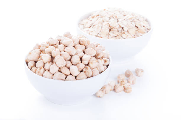 istock Low carbohydrates in assortment, chickpeas and oat flakes 1268032875