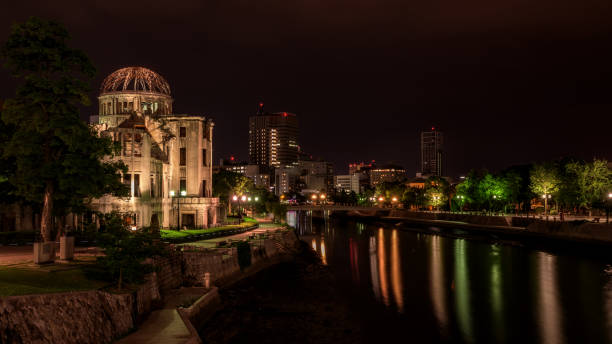 istock Peace Dome in Hiroshima Japan at night with skyline reflection 1268039106