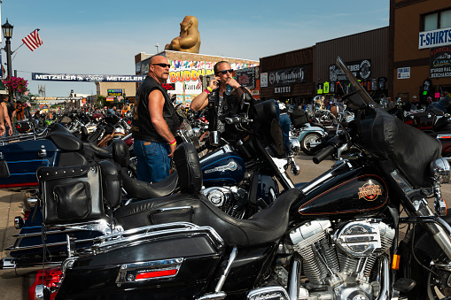 Sturgis, South Dakota - August 8, 2014: Motorcycles parked in the main street of the city of Sturgis, during the annual Sturgis Motorcycle rally.