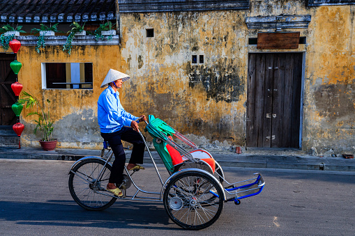 Vietnamese cycle rickshaw in old town in Hoi An city, Vietnam
