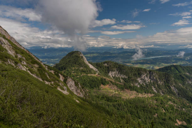 istock Ferlacher spitze hill under Mittagskogel hill in summer green day 1268041638
