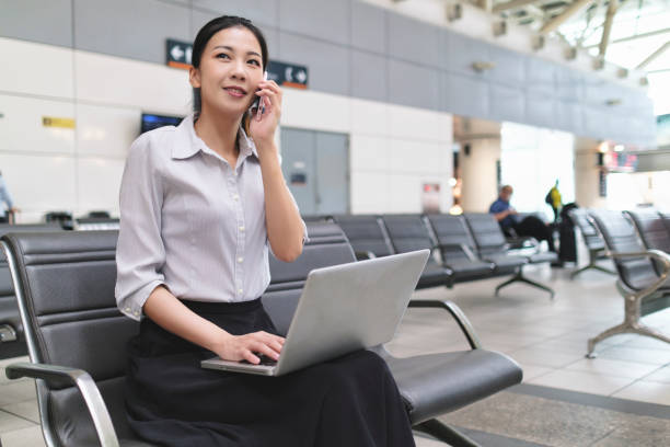 istock Woman waiting for train at the station 1268042870