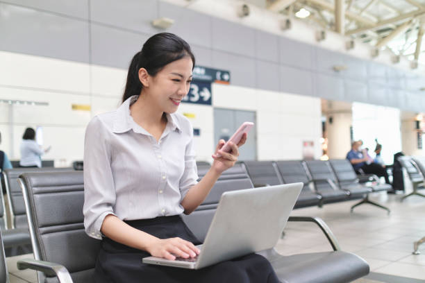 istock Woman waiting for train at the station 1268042881