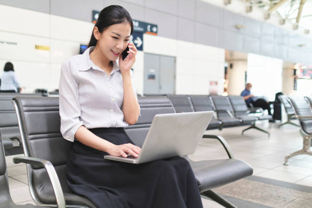 istock Woman waiting for train at the station 1268042887
