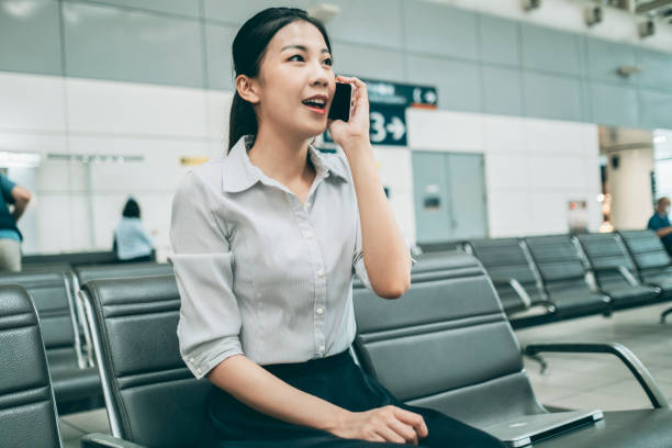 istock Woman waiting for train at the station 1268042919