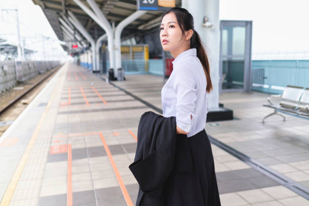 istock Young woman waiting for high speed rail 1268043074