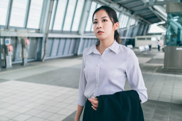 istock Young woman waiting for high speed rail 1268043099