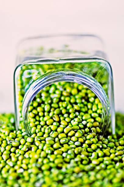 istock Green Mung beans and glass jar. 1268046649