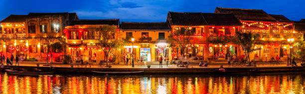 Panoramic view of Old Town in Hoi An city, Vietnam Evening view of Old Town in Hoi An city, Vietnam. Hoi An is situated on the east coast of Vietnam. Its old town is a UNESCO World Heritage Site because of its historical buildings. chinese lantern lily photos stock pictures, royalty-free photos & images