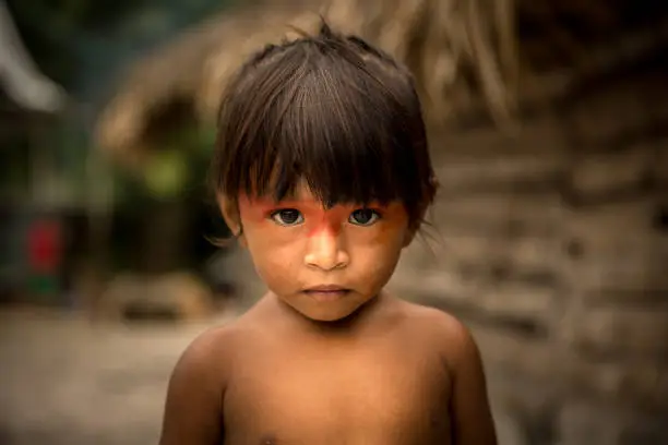 Portrait of a native child from Tupi Guarani ethnicity