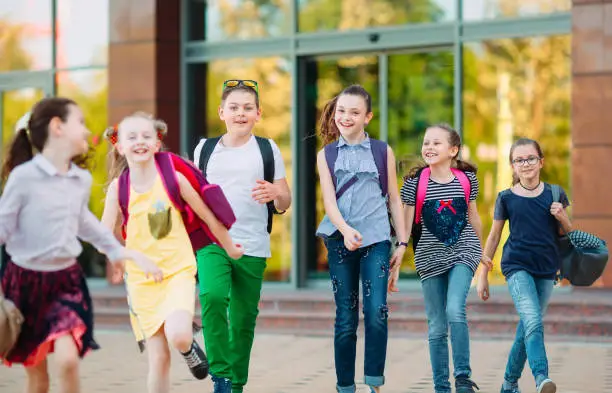 Photo of Group of kids going to school together.