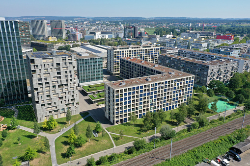 Zurich with several new residential buildings located between the District Oerlikon and Seebach. The wide angle image was made during a beautiful day in summer.