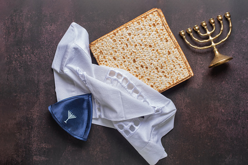 Traditional symbols of Jewish holiday - matzo, kippa, menorah