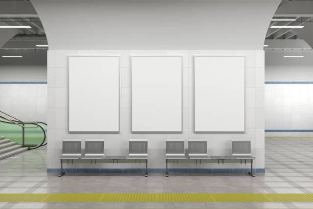 Blank posters mock up on the wall of underground subway station.
