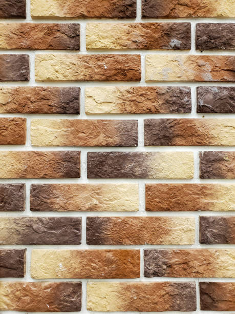 istock background of the wall is a brown brick surface. Abstract wall background 1268058632