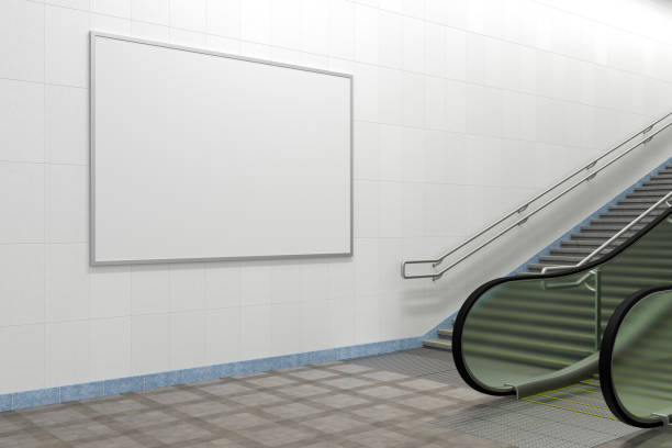 istock Horizontal poster mock up on the wall with escalator and stairs. 1268058731