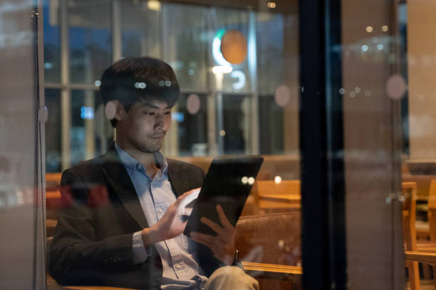 istock Businessman having Zoom video conferencing call via tablet. 1268064342