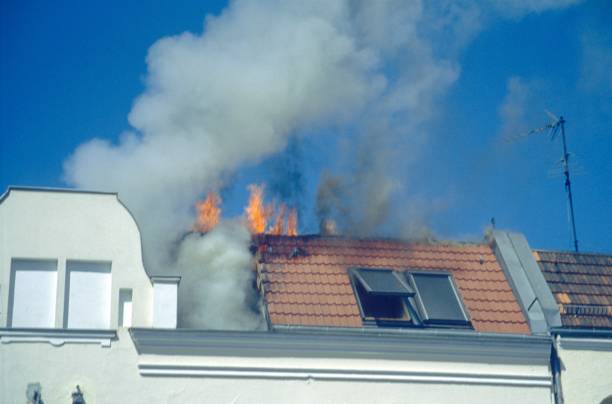 istock Roof fire in a tenement house 1268064538