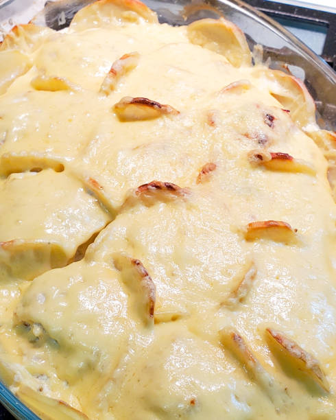 istock Ready-made casserole with minced meat and potatoes under a cheese crust, close-up. Cooking at home 1268065541