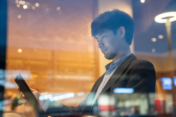 istock Businessman browsing internet, chatting, blogging. male holding tablet and looking on his screen. 1268066473