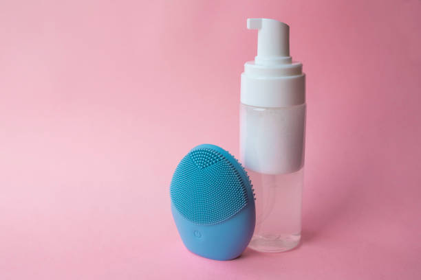 istock Silicone brush for washing face and cosmetic foam 1268067843