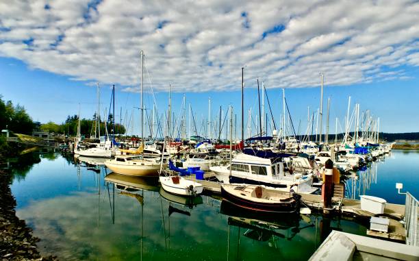 istock calm reflective sail boats with a dramatic skyline 1268072530