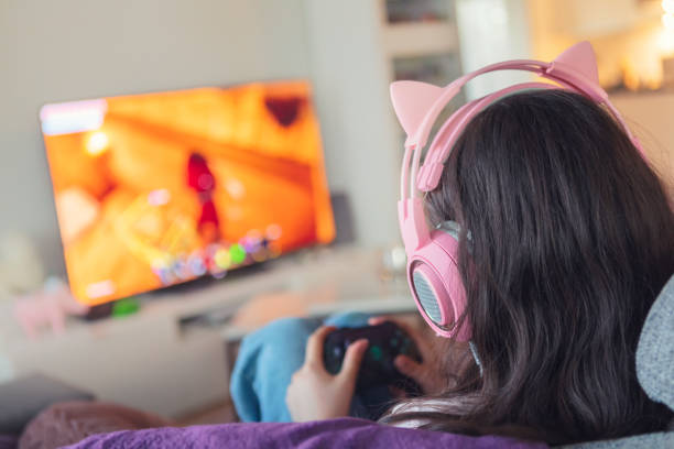 istock Playing video games in the living room 1268072987