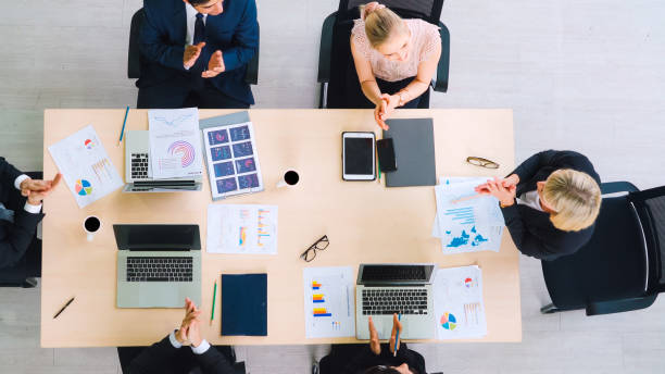 istock Business people group meeting shot from top view 1268074860