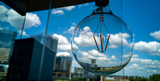 Free Stock Photo of Three hanging light bulbs reflecting in glass ...
