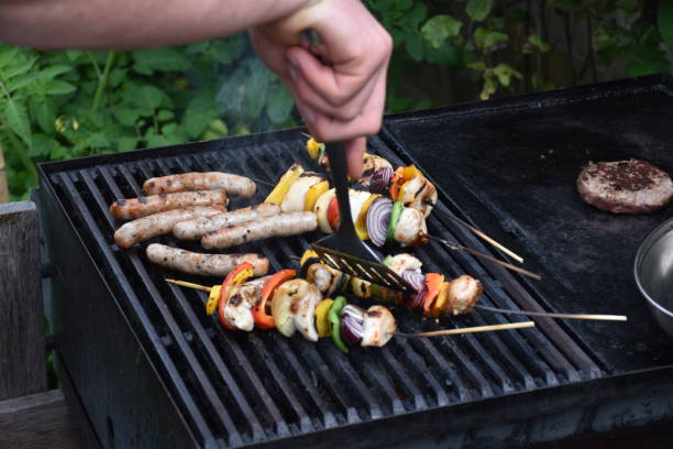 istock Man cooking on the grill 1268080630