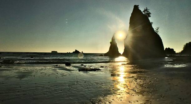 istock sea stacks and sunshine reflections 1268080692