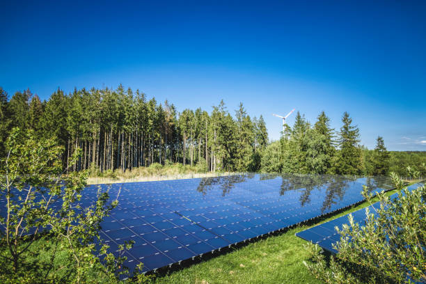 istock renewable energy: wind turbines and modern solar panels (HDRi) 1268084725